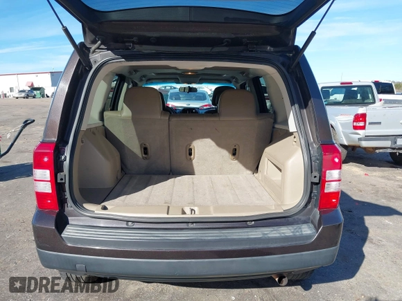 2014 Jeep Patriot High Altitude with VIN 1C4NJPFA7ED851059, listed as a IAAI auction lot 41306629 with 156,270 mi miles and . Bid and sale history available at carsss.com. Image 16.