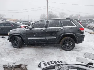 2013 Jeep Grand Cherokee Limited with VIN 1C4RJFBT4DC567444, listed as a IAAI auction lot 41300410 with 121,665 mi miles. Bid and sale history available at carsss.com. Image 15.