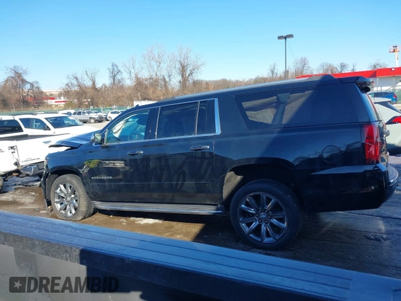 2018 Chevrolet Suburban Premier z VIN 1GNSKJKCXJR134700, wystawiony jako IAAI lot #41282040 z przebiegiem 105 554 mil mil oraz . Historia ofert i sprzedaży dostępna na DreamBid. Obrazek 14.