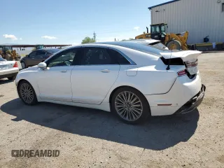 2013 Lincoln MKZ z VIN 3LN6L2GKXDR814615, wystawiony jako Copart lot #65654335 z przebiegiem 100 510 mil mil oraz Szkoda całkowita • Salvage title. Historia ofert i sprzedaży dostępna na DreamBid. Obrazek 2.