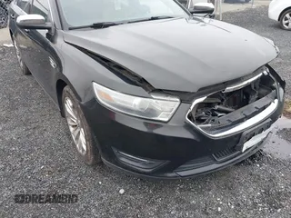 2014 Ford Taurus Limited with VIN 1FAHP2F81EG113984, listed as a IAAI auction lot 41542792 with 213,206 mi miles. Bid and sale history available at carsss.com. Image 6.