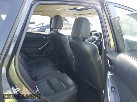 2016 Mazda CX-5 Grand Touring z VIN JM3KE2DYXG0649781, wystawiony jako IAAI lot #41636329 z przebiegiem 83 433 mil mil oraz . Historia ofert i sprzedaży dostępna na DreamBid. Obrazek 8.