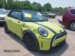 2023 MINI Convertible with VIN WMW23DL00P3R03046, listed as a IAAI auction lot 42382120 with 34,611 mi miles and . Bid and sale history available at DreamBid. Image 1.