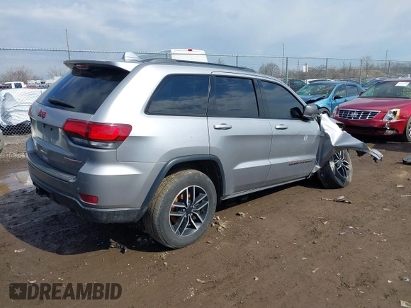 2021 Jeep Grand Cherokee Trailhawk with VIN 1C4RJFLG6MC683973, listed as a IAAI auction lot 41662344 with 95,890 mi miles. Bid and sale history available at carsss.com. Image 4.