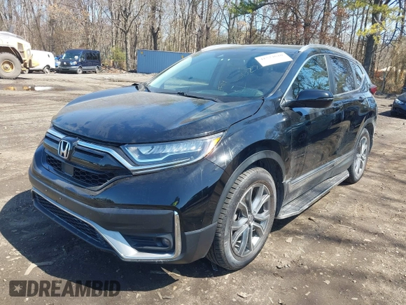 2020 Honda CR-V Touring with VIN 2HKRW2H98LH660573, listed as a IAAI auction lot 41524610 with 37,493 mi miles and . Bid and sale history available at DreamBid. Image 6.