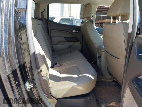 2015 GMC Canyon 2WD SLT with VIN 1GTG5CE35F1249224, listed as a IAAI auction lot 41697796 with 180,230 mi miles. Bid and sale history available at carsss.com. Image 8.