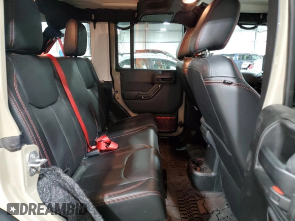 2018 Jeep Wrangler Unlimited Rubicon Recon z VIN 1C4HJWFG3JL830219, wystawiony jako Copart lot #47385325 z przebiegiem 121 679 mil mil oraz Szkoda całkowita • Salvage title. Historia ofert i sprzedaży dostępna na DreamBid. Obrazek 12.