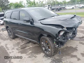2025 Dodge Durango R/T z VIN 1C4SDJCT4SC502679, wystawiony jako IAAI lot #42287131 z przebiegiem 4 026 mil mil oraz . Historia ofert i sprzedaży dostępna na DreamBid. Obrazek 1.