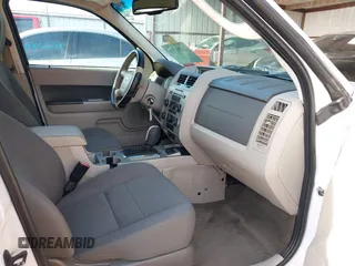 2009 Ford Escape Hybrid with VIN 1FMCU49399KC19803, listed as a IAAI auction lot 42004776 with 163,353 mi miles and . Bid and sale history available at DreamBid. Image 5.