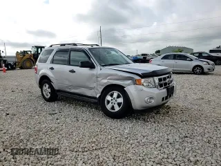 2012 Ford Escape XLT z VIN 1FMCU9DG5CKA92739, wystawiony jako Copart lot #62380375 z przebiegiem 68 755 mil mil oraz Szkoda całkowita • Salvage title. Historia ofert i sprzedaży dostępna na DreamBid. Obrazek 14.