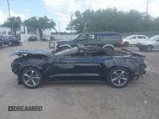2017 Ford Mustang EcoBoost Premium z VIN 1FATP8UH5H5308096, wystawiony jako IAAI lot #42617286 z przebiegiem Nie podano mil oraz . Historia ofert i sprzedaży dostępna na DreamBid. Obrazek 13.