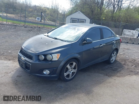2016 Chevrolet Sonic LTZ z VIN 1G1JE5SB4G4150545, wystawiony jako IAAI lot #41914830 z przebiegiem 166 650 mil mil oraz . Historia ofert i sprzedaży dostępna na DreamBid. Obrazek 2.