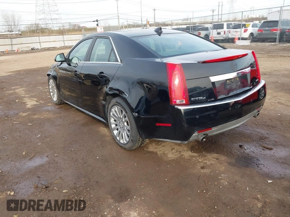 2011 Cadillac CTS Premium with VIN 1G6DS5ED7B0101210, listed as a IAAI auction lot 41802027 with 127,701 mi miles. Bid and sale history available at carsss.com. Image 3.