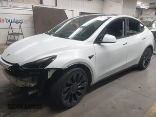 2023 Tesla Model Y Performance with VIN 7SAYGDEF5PF665560, listed as a IAAI auction lot 41809349 with Not Provided miles and . Bid and sale history available at DreamBid. Image 2.