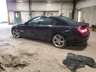 2014 BMW 7 Series 750i xDrive with VIN WBAYB6C55ED224739, listed as a Copart auction lot 84935364 with 173,805 mi miles and Salvage Title. Bid and sale history available at carsss.com. Image 2.