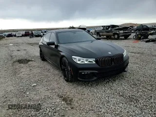 2018 BMW 7 Series 750i with VIN WBA7F0C55JGM23537, listed as a Copart auction lot 76824074 with 64,682 mi miles and Salvage Title. Bid and sale history available at carsss.com. Image 13.