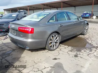 2013 Audi A6 Premium Plus z VIN WAUGGAFC8DN077982, wystawiony jako IAAI lot #41783832 z przebiegiem 95 981 mil mil oraz . Historia ofert i sprzedaży dostępna na DreamBid. Obrazek 4.
