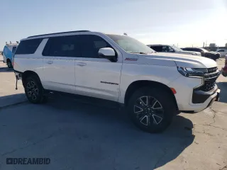 2022 Chevrolet Suburban Z71 with VIN 1GNSKDKD6NR344436, listed as a Copart auction lot 86920644 with 28,430 mi miles and Salvage Title. Bid and sale history available at carsss.com. Image 4.