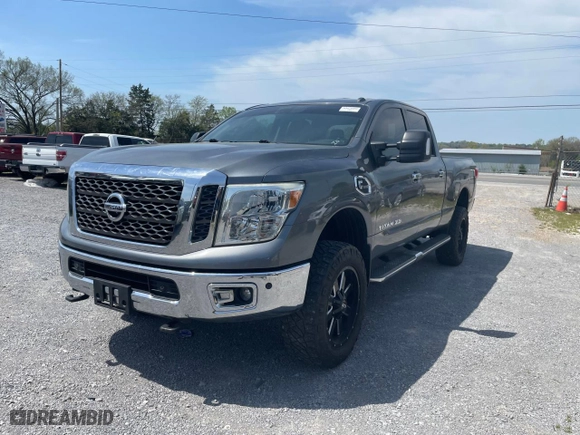 2016 Nissan Titan XD Platinum Reserve with VIN 1N6BA1F2XGN516798, listed as a Copart auction lot 53584635 with 104,737 mi miles and Clean Title. Bid and sale history available at carsss.com. Image 2.
