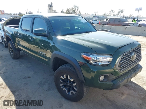 2021 Toyota Tacoma 4WD SR5 with VIN 3TMDZ5BN2MM101265, listed as a IAAI auction lot 41272874 with 51,989 mi miles. Bid and sale history available at carsss.com. Image 1.