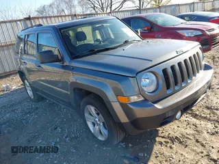 2013 Jeep Patriot Latitude with VIN 1C4NJPFA1DD169521, listed as a IAAI auction lot 41812936 with 133,088 mi miles. Bid and sale history available at carsss.com. Image 1.