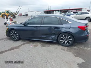 2023 Honda Civic EX with VIN 2HGFE1F73PH312228, listed as a IAAI auction lot 42185408 with 19,339 mi miles and . Bid and sale history available at DreamBid. Image 14.