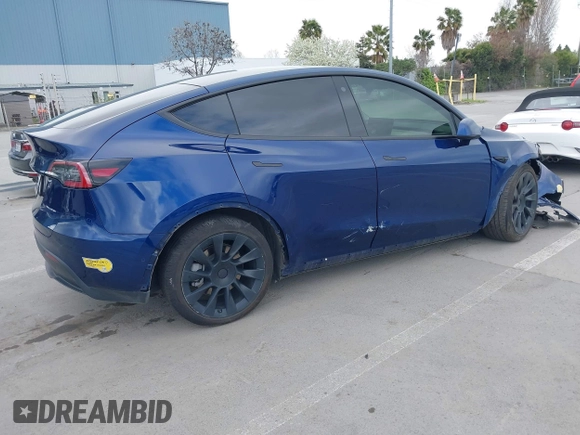 2022 Tesla Model Y Long Range with VIN 7SAYGDEE6NF480146, listed as a IAAI auction lot 41906361 with 31,939 mi miles and . Bid and sale history available at carsss.com. Image 4.