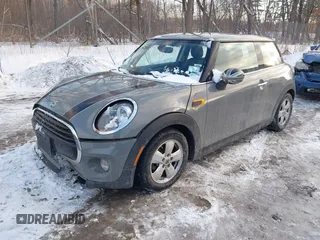 2019 MINI Hardtop Cooper with VIN WMWXP5C52K2H91038, listed as a IAAI auction lot 41509304 with 77,123 mi miles and . Bid and sale history available at DreamBid. Image 17.