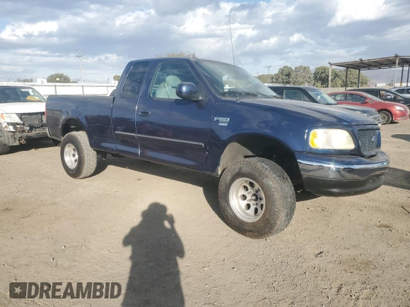 2003 Ford F-150 XL with VIN 1FTRX17L13NA95202, listed as a Copart auction lot 87766385 with 124,961 mi miles and Salvage Title. Bid and sale history available at carsss.com. Image 4.