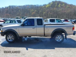 1998 Ford Ranger XL with VIN 1FTZR15X2WTA29628, listed as a IAAI auction lot 41972607 with 149,628 mi miles. Bid and sale history available at carsss.com. Image 14.