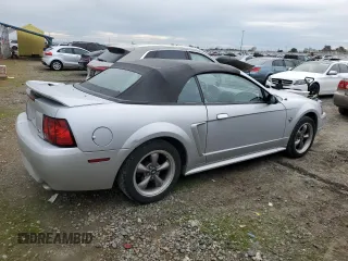 1999 Ford Mustang GT with VIN 1FAFP45X0XF234431, listed as a Copart auction lot 47402055 with 105,861 mi miles and Salvage title. Bid and sale history available at DreamBid. Image 3.