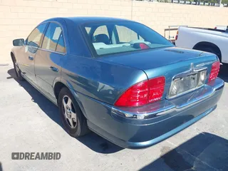 2001 Lincoln LS w/Base Pkg with VIN 1LNHM87A31Y617332, listed as a IAAI auction lot 41317767 with 141,931 mi miles. Bid and sale history available at carsss.com. Image 3.