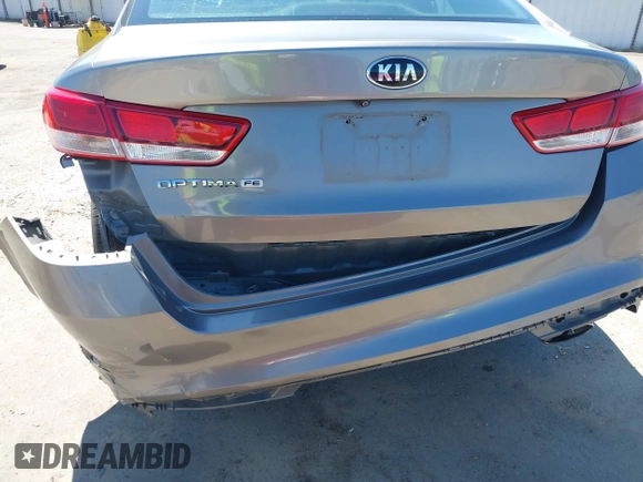 2016 Kia Optima LX with VIN 5XXGT4L36GG098804, listed as a IAAI auction lot 42772231 with 206,471 mi miles and . Bid and sale history available at DreamBid. Image 19.