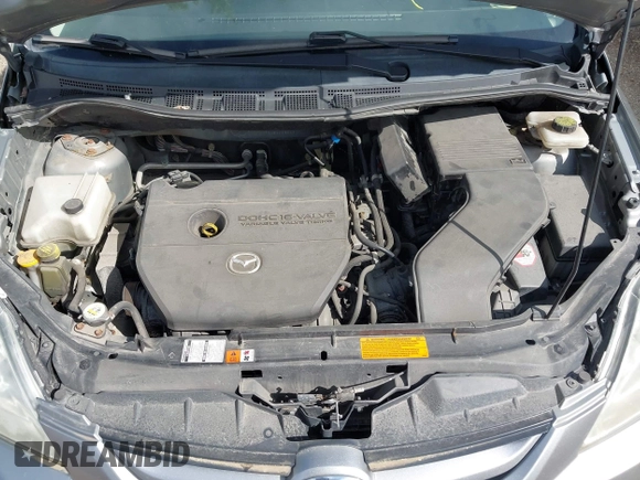 2010 Mazda 5 Sport with VIN JM1CR2W31A0384307, listed as a IAAI auction lot 42305589 with 144,372 mi miles and . Bid and sale history available at DreamBid. Image 10.