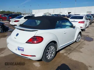 2019 Volkswagen Beetle S with VIN 3VW5DAAT0KM507437, listed as a IAAI auction lot 41380821 with 28,010 mi miles and . Bid and sale history available at DreamBid. Image 4.