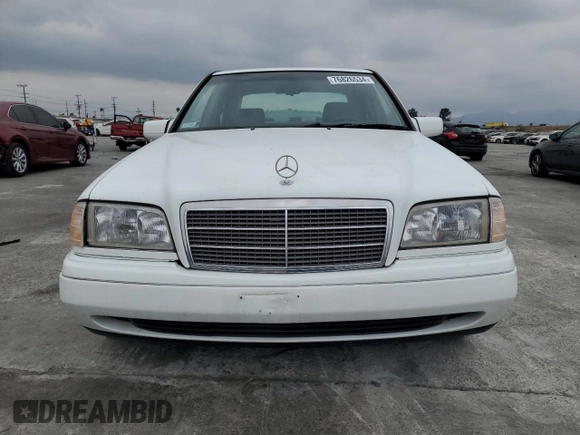 1997 Mercedes-Benz C with VIN WDBHA28E3VF582237, listed as a Copart auction lot 76826534 with 240,702 mi miles and Clean Title. Bid and sale history available at carsss.com. Image 5.