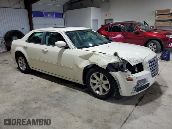 2007 Chrysler 300 with VIN 2C3LA43R37H879385, listed as a Copart auction lot 65837564 with 144,062 mi miles and Salvage Title. Bid and sale history available at carsss.com. Image 4.