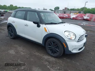 2013 MINI Countryman with VIN WMWZB3C53DWM08244, listed as a IAAI auction lot 42281364 with 139,894 mi miles and . Bid and sale history available at DreamBid. Image 1.