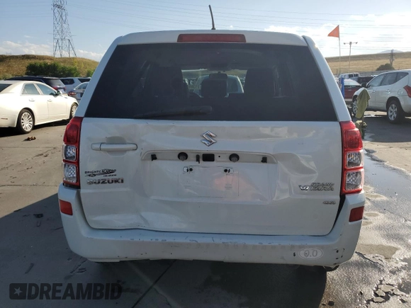 2012 Suzuki Grand Vitara Premium z VIN JS3TD0D64C4100245, wystawiony jako Copart lot #71365134 z przebiegiem 100 501 mil mil oraz Szkoda całkowita • Salvage title. Historia ofert i sprzedaży dostępna na DreamBid. Obrazek 6.