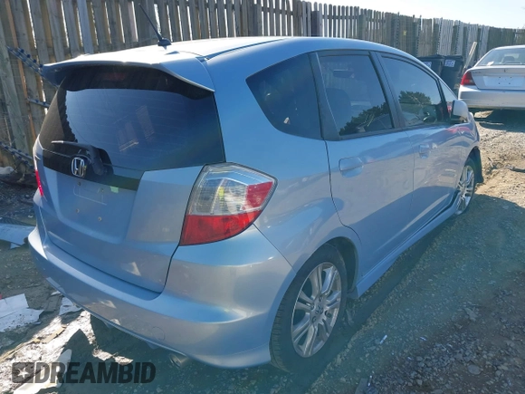 2009 Honda Fit Sport with VIN JHMGE88409S044540, listed as a IAAI auction lot 41933396 with 218,346 mi miles. Bid and sale history available at carsss.com. Image 4.