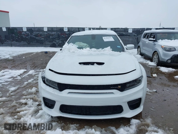 2022 Dodge Charger Scat Pack Widebody with VIN 2C3CDXGJ4NH183094, listed as a IAAI auction lot 41300119 with 31,800 mi miles and . Bid and sale history available at carsss.com. Image 13.