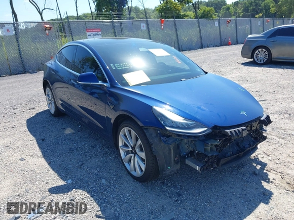 2019 Tesla Model 3 Mid Range with VIN 5YJ3E1EA6KF402308, listed as a IAAI auction lot 40077902 with 89,794 mi miles and . Bid and sale history available at carsss.com. Image 1.