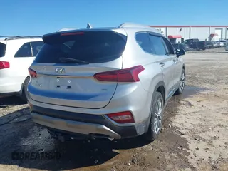 2020 Hyundai Santa Fe Limited with VIN 5NMS5CAD6LH304340, listed as a IAAI auction lot 41796115 with 56,989 mi miles. Bid and sale history available at carsss.com. Image 4.