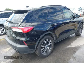 2021 Ford Escape SE with VIN 1FMCU0G62MUA12575, listed as a IAAI auction lot 42293939 with 96,359 mi miles and . Bid and sale history available at DreamBid. Image 4.