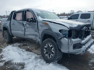 2019 Toyota Tacoma SR z VIN 3TMCZ5AN8KM211246, wystawiony jako IAAI lot #41574346 z przebiegiem 66 825 mil mil oraz . Historia ofert i sprzedaży dostępna na DreamBid. Obrazek 1.