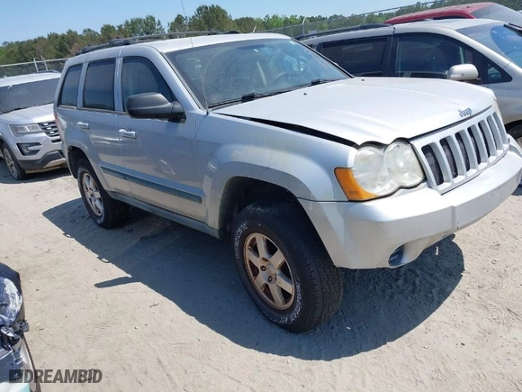 2008 Jeep Grand Cherokee Laredo with VIN 1J8GS48K28C161376, listed as a IAAI auction lot 42048390 with 206,679 mi miles. Bid and sale history available at carsss.com. Image 1.