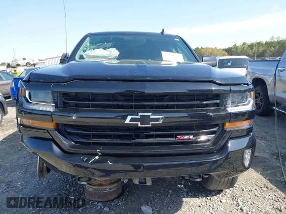 2017 Chevrolet Silverado 1500 LT with VIN 3GCUKREC4HG310842, listed as a IAAI auction lot 41908001 with 179,814 mi miles and . Bid and sale history available at DreamBid. Image 13.
