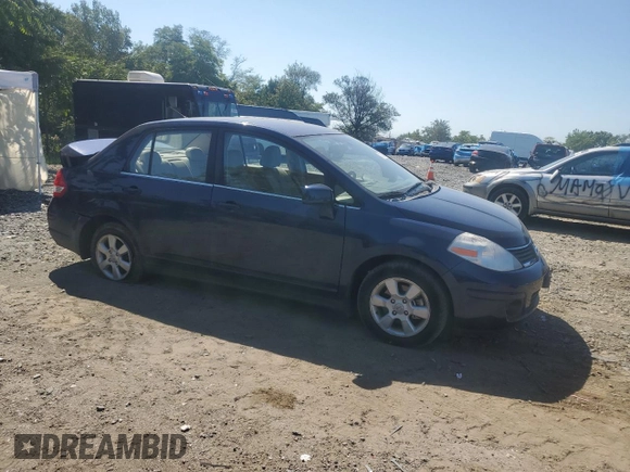 2007 Nissan Versa 1.8 SL with VIN 3N1BC11E27L432802, listed as a Copart auction lot 71018594 with 118,795 mi miles and Salvage Title. Bid and sale history available at carsss.com. Image 4.