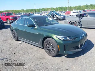 2024 BMW i4 eDrive35 z VIN WBY43AW08RFS39794, wystawiony jako IAAI lot #42063949 z przebiegiem 29 916 mil mil oraz . Historia ofert i sprzedaży dostępna na DreamBid. Obrazek 1.