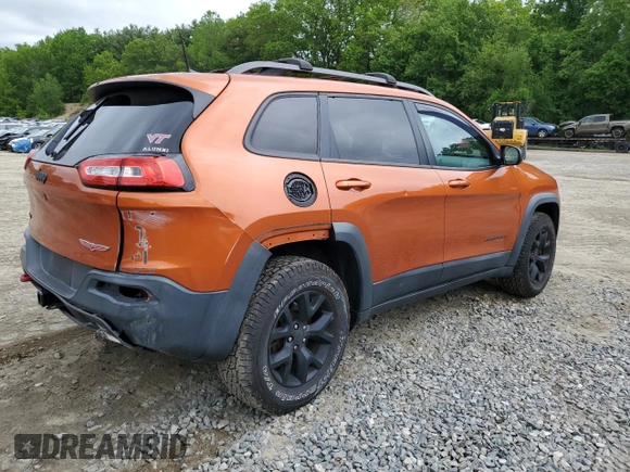 2016 Jeep Cherokee Trailhawk with VIN 1C4PJMBS2GW255368, listed as a Copart auction lot 59010305 with 105,667 mi miles and Salvage title. Bid and sale history available at DreamBid. Image 3.